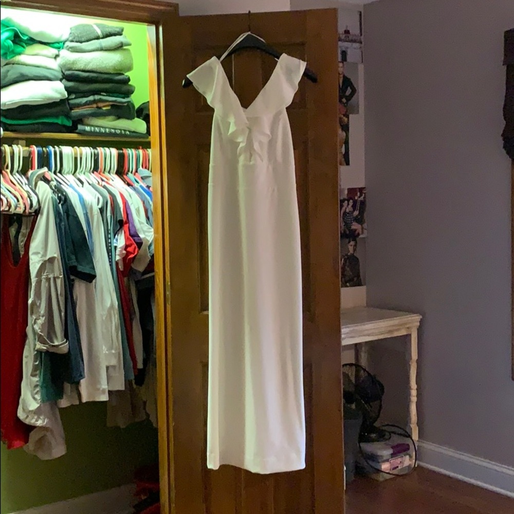 a long white bridesmaids or prom dress